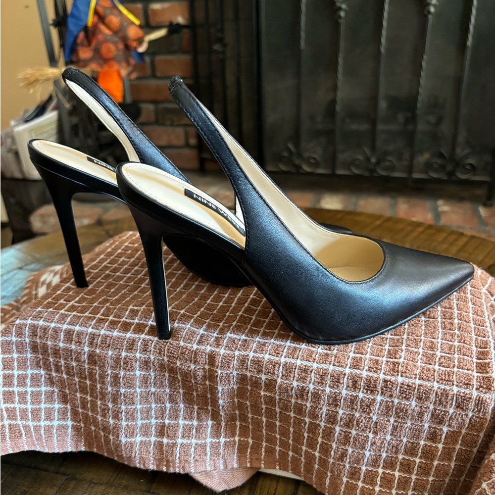 Nine West sling back heels, black leather; 4” heel.